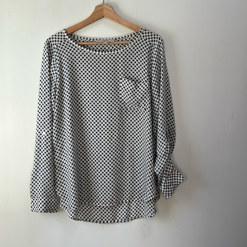 Loft women’s size M long blouse white with black and red geo pattern.